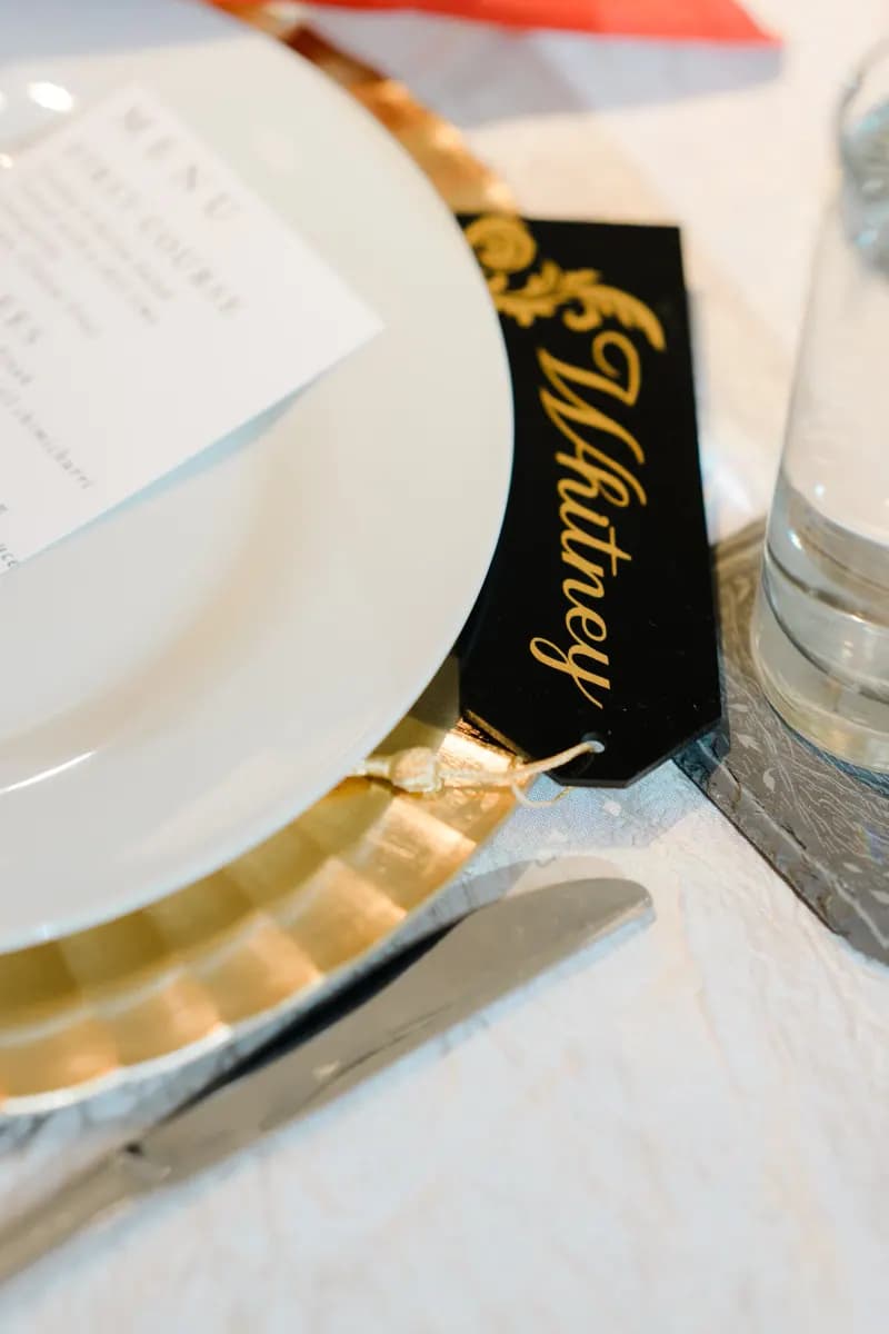 Black acrylic place card with script name