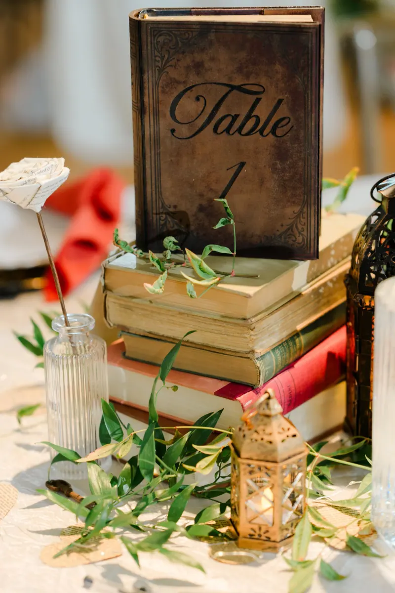 Miniature book table number staged on stacked books