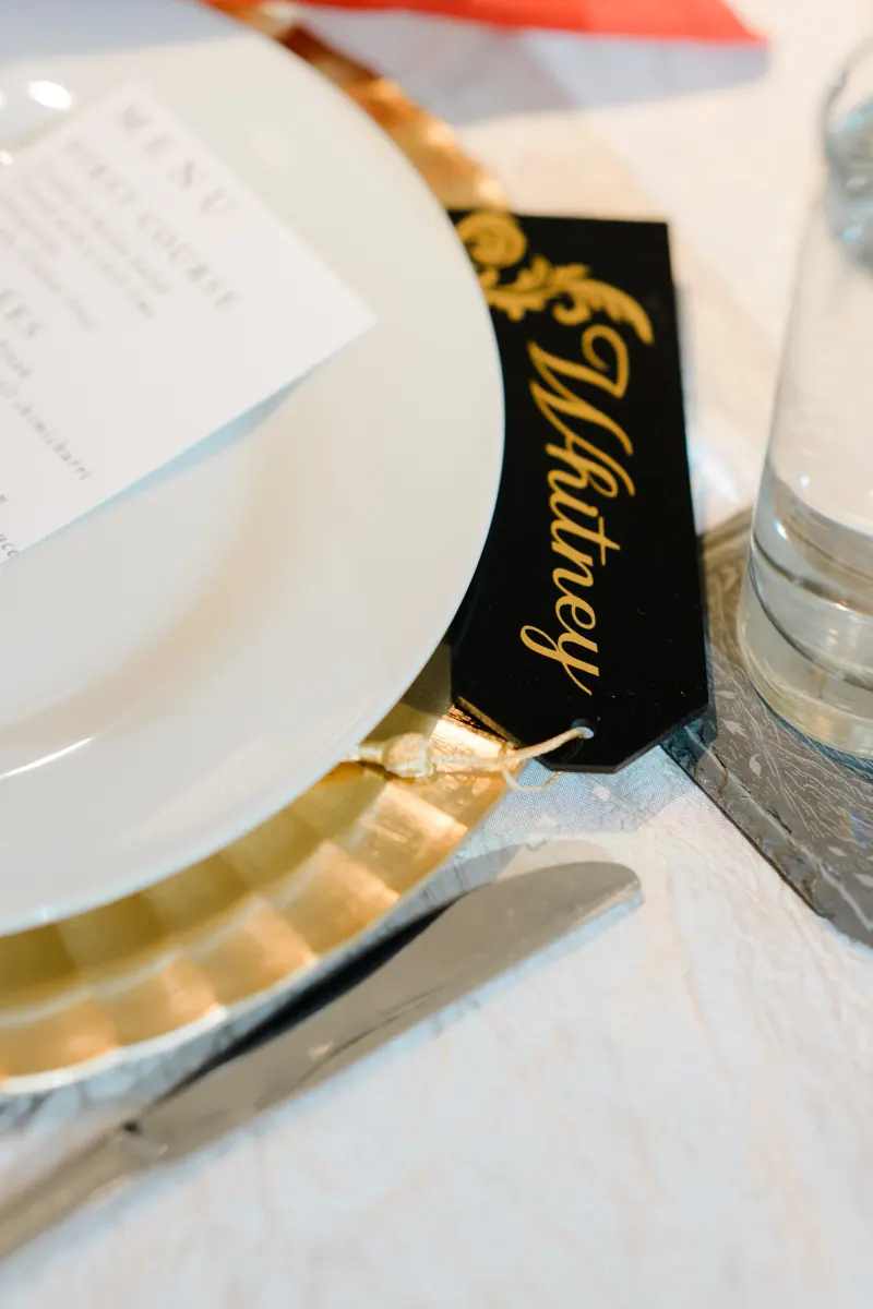 Black acrylic place card with script name